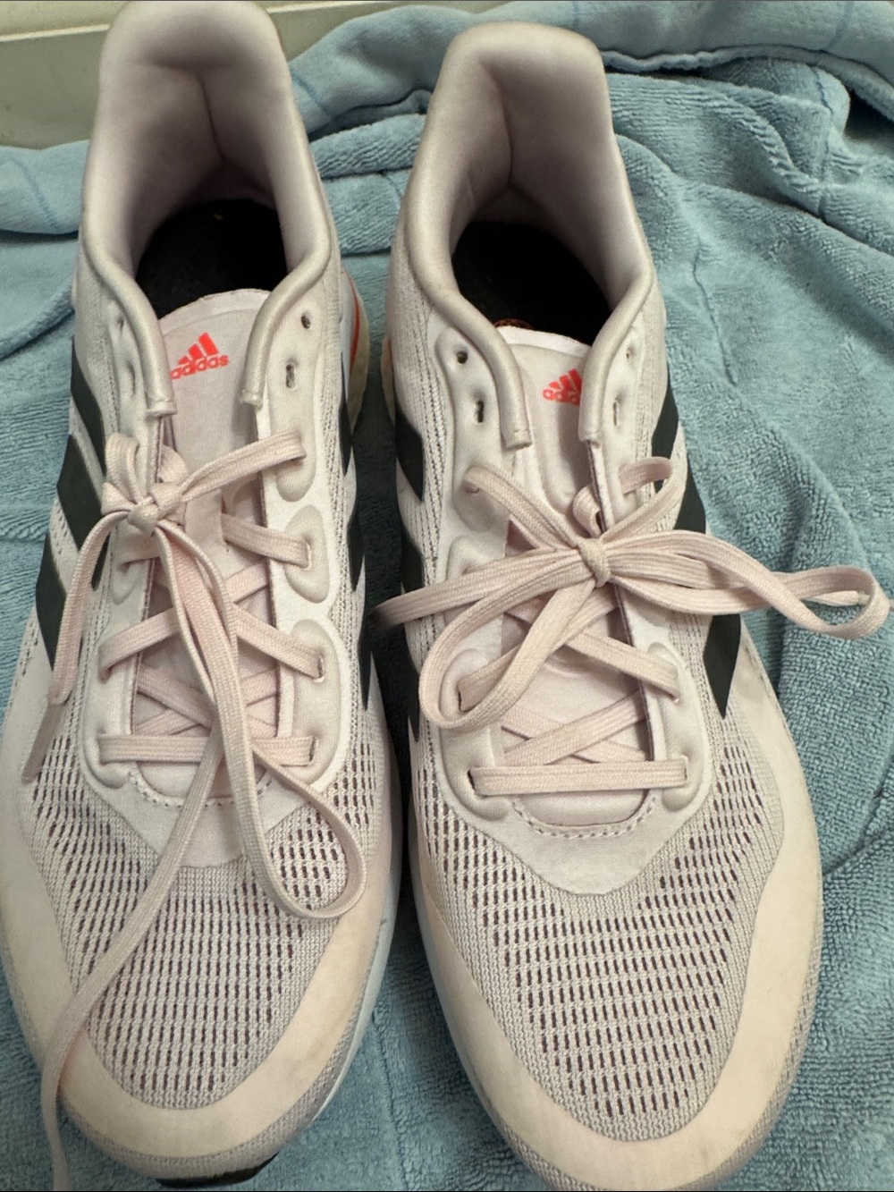 adidas supernova  Women’s Pale Pink Athletic Sneakers with Black Three Stripes